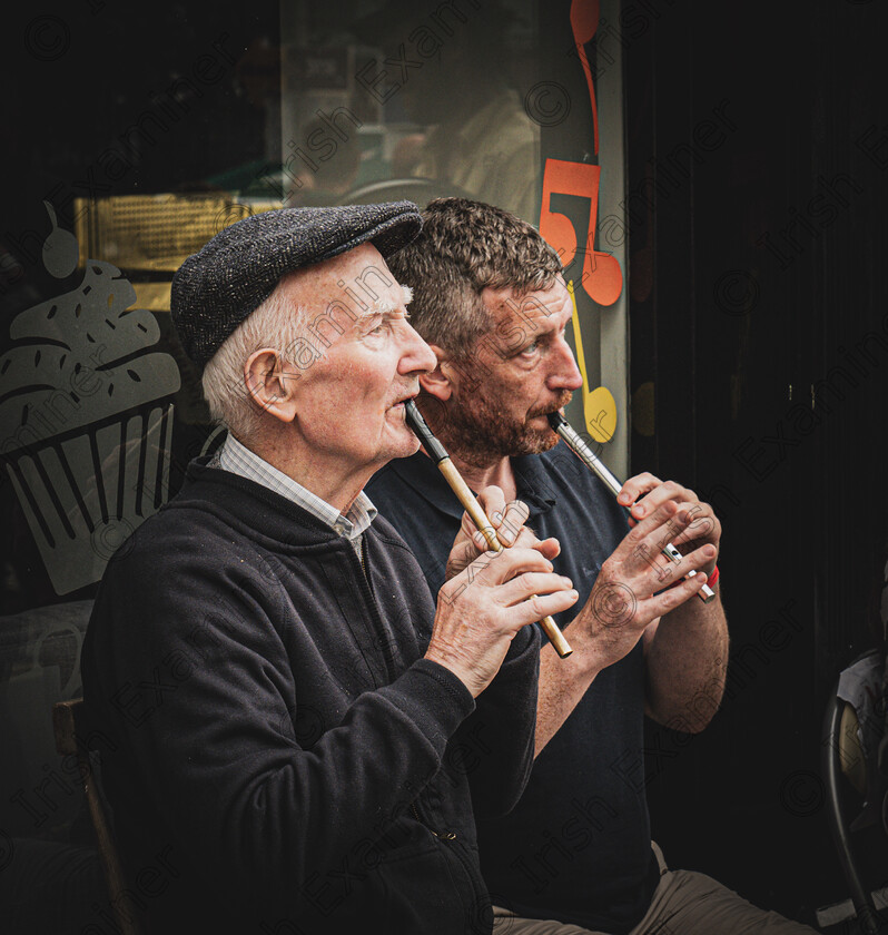 A0CCE18D-A0E2-4780-B379-1EF58BECC6E1 
 T(w)in whistles - street musicians during the Fleadh, Wexford