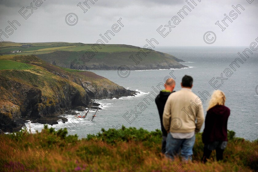 Astrid-ship-15 
 XXjob 24/07/2013 NEWS Watching as the Atlantic pound The Dutch training ship Astrid on the Rocks near the entrance to Oysterhaven Harbour.
Picture: Denis Scannell