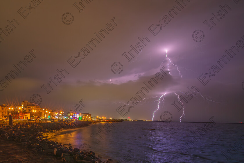 Stick Man 
 Stick Man
I took this image looking back over Salthill Promenade during a lighting storm on 11th August 2024. The lightning resembles a stick man walking over Galway city and out into the bay.