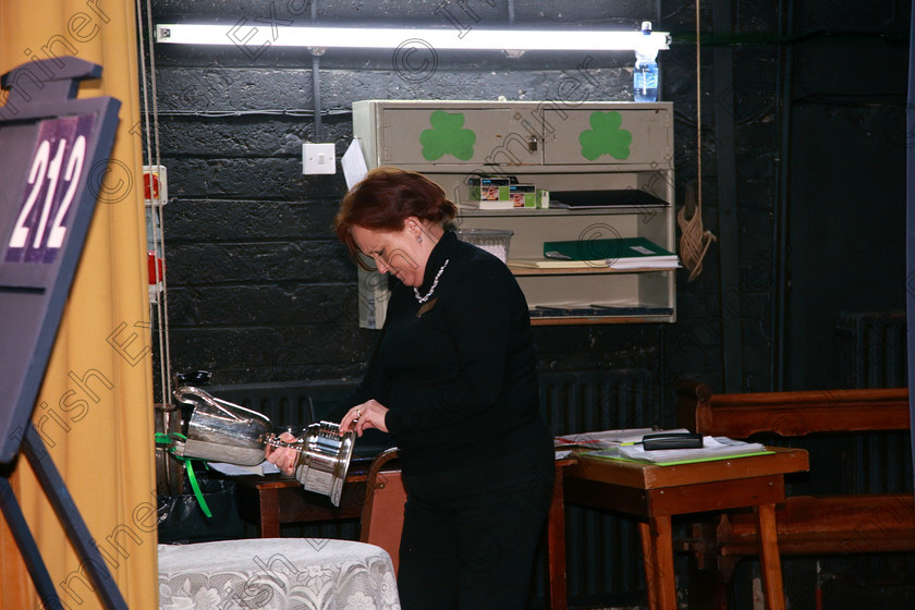 Feis09022018Fri29 
 29
Stage hand Edel making sure she have the correct Cup for the later Class.
 Instrumental Music Class: 212: Woodwind Solo16 Years and Under Feis Maitiú 92nd Festival held in Fr. Mathew Hall. EEjob 09/02/2018 Picture: Gerard Bonus.