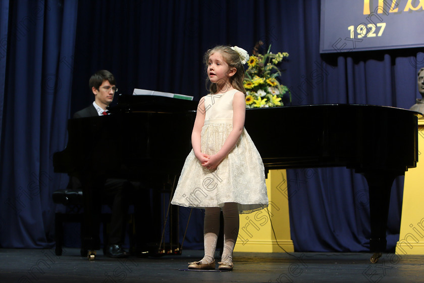 Feis27032018Tue34 
 33~34
Emily Lynch singing backed by Accompanist Michael Young.
 Singing Class: 56: 7 Years and Under Crawley The Penguin Dance Feis Maitiú 92nd Festival held in Fr. Mathew Hall. EEjob 27/03/2018 Picture: Gerard Bonus