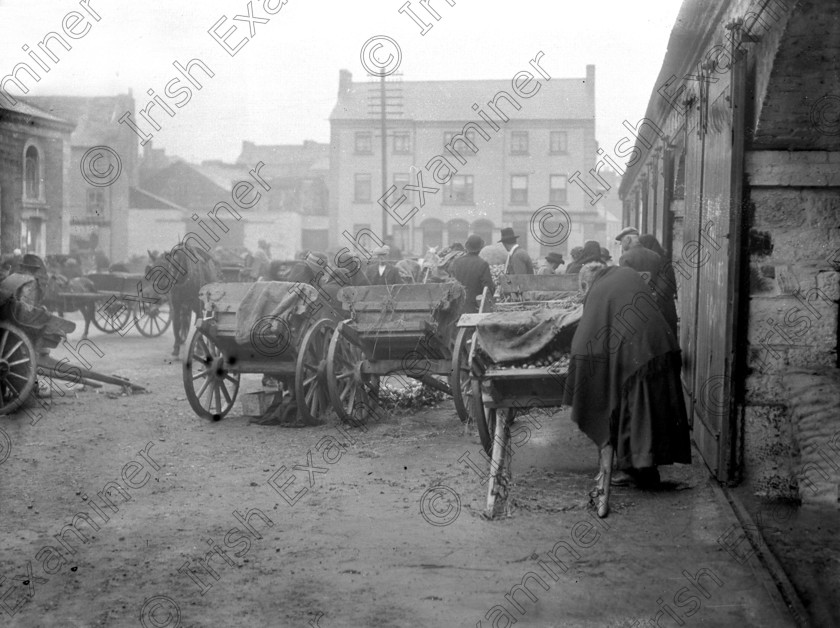 862507 862507 
 For 'READY FOR TARK'
Street fair at Youghal circa 1914 Ref. 647 old black and white east cork towns carts