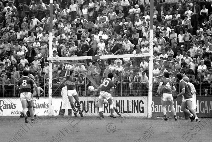 final 
 Please archive -
Cork v. Kerry in the Munster senior football final at Pairc Ui Chaoimh. Cork wing-forward Tadgh Murphy punches the ball to the net past Kerry goalkeeper Charlie Nelligan 17/7/1983 Ref. 276/113 old black and white gaa gaelic games