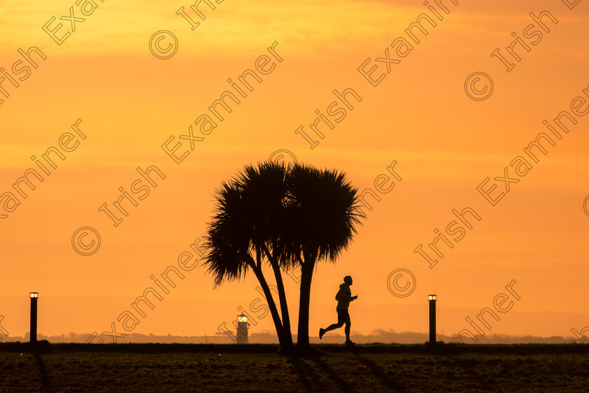 25 FEB - Claddagh (9 of 13) 
 Rise and Shine!, A runner at sunrise along the Galway Bay. Picture: Brendan O' Brien