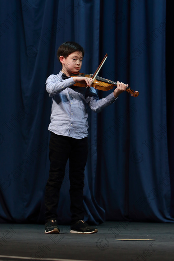 Feis0402109Mon31 
 31~32
Silver Medallist Zwyisen Bian from Limerick performing.

Class: 242: Violin Solo 8 Years and Under (a) Carse–Petite Reverie (Classical Carse Bk.1) (b) Contrasting piece not to exceed 2 minutes.

Feis Maitiú 93rd Festival held in Fr. Matthew Hall. EEjob 04/02/2019. Picture: Gerard Bonus