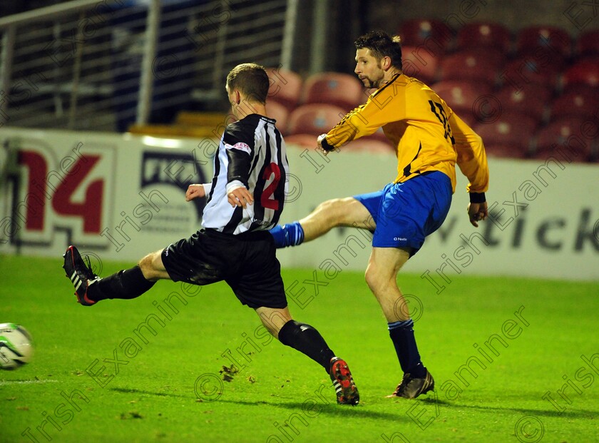 1584981 1584981 
 College Corinthians David Welch hammers home his second goal from Midleton's Eddie Nolan during the Keane cup final against Midleton FC at Turners Cross
Picture: Eddie O'Hare