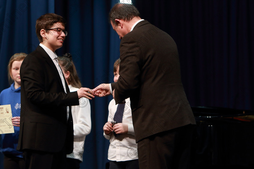 Feis13022019Wed21 
 21
Adjudicator: Steven Roberts presenting the Silver Medal to Martin Chavdarov.

Class: 205: Brass Solo 12Years and Under Programme not to exceed 5 minutes.

Class: 205: Brass Solo 12Years and Under Programme not to exceed 5 minutes.