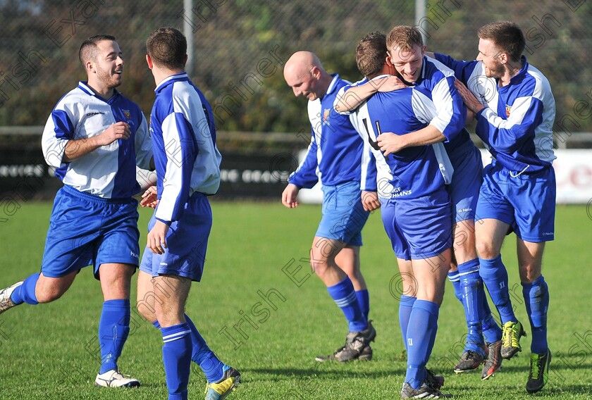 1679561 1679561 
 EEjob 08/11/2014
Echo Sport
College Corinthians' goalscorer Richie Cronin is congratulated by his team-mates, during their MSL Senior Premier Division clash with Midleton at Castletreasure.
Picture: David Keane.