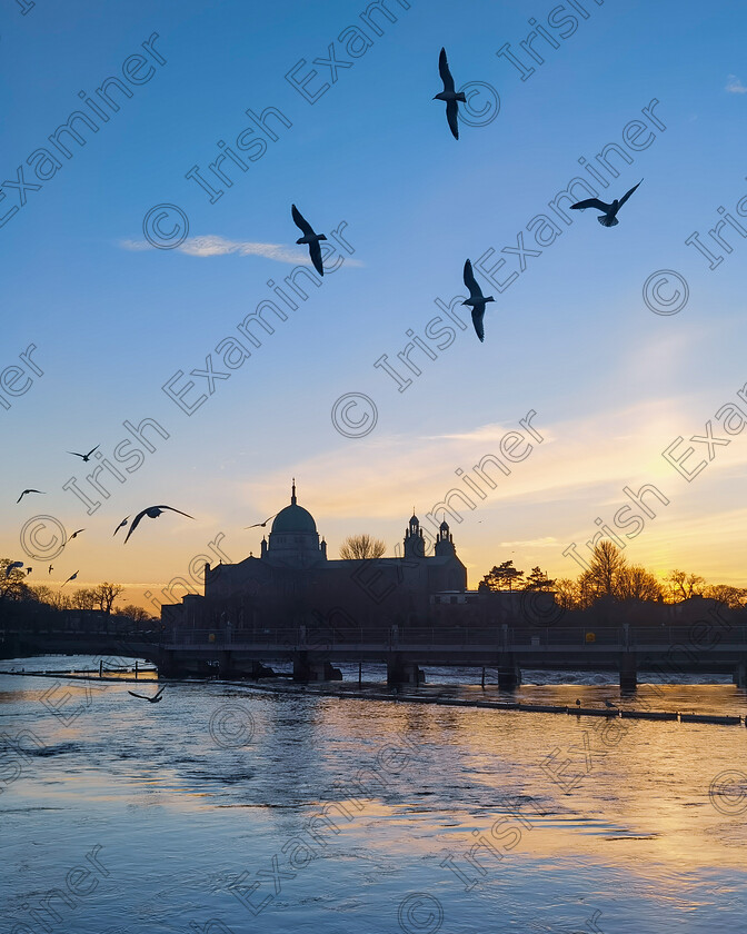 Michael Deligan Golden Hour at River Corrib 
 Golden hour at River Corrib overlooking Galway Cathedral