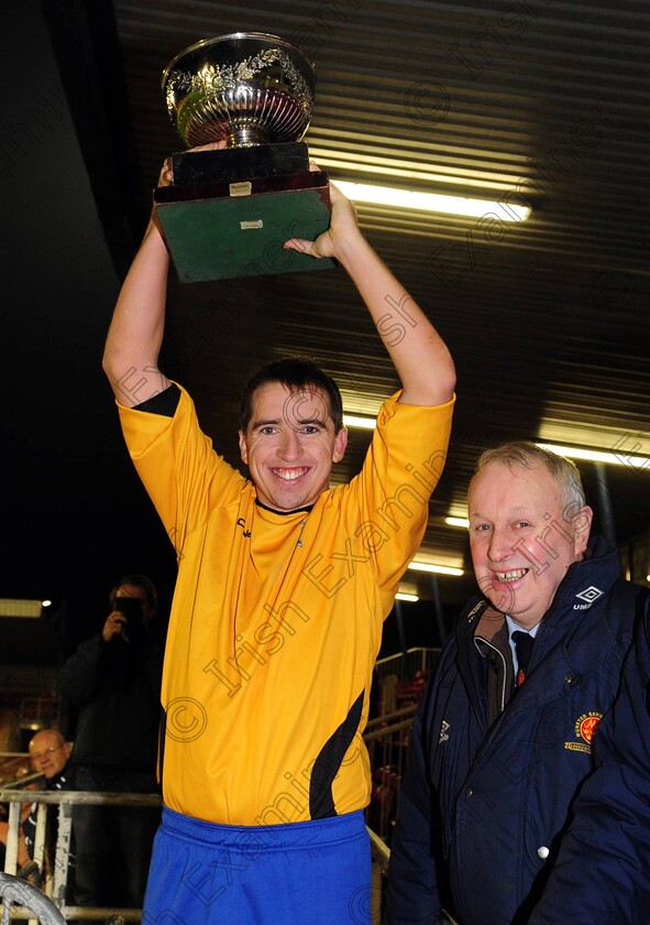 1584960 1584960 
 College Corinthians captain Ricky O'Sullivan raises the trophy after defeating Midleton in the Keane cup final against Midleton FC at Turners Cross
Picture: Eddie O'Hare