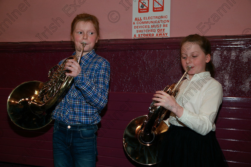 Feis06022018Tue17 
 17
Performers tuning up; Ella McCarthy and Joy Hedderman from Rochestown and Lovers Walk.
 Instrumental Music Class: 205: Brass Solo 12 Years and Under Feis Maitiú 92nd Festival held in Fr. Mathew Hall. EEjob 05/02/2018 Picture: Gerard Bonus.