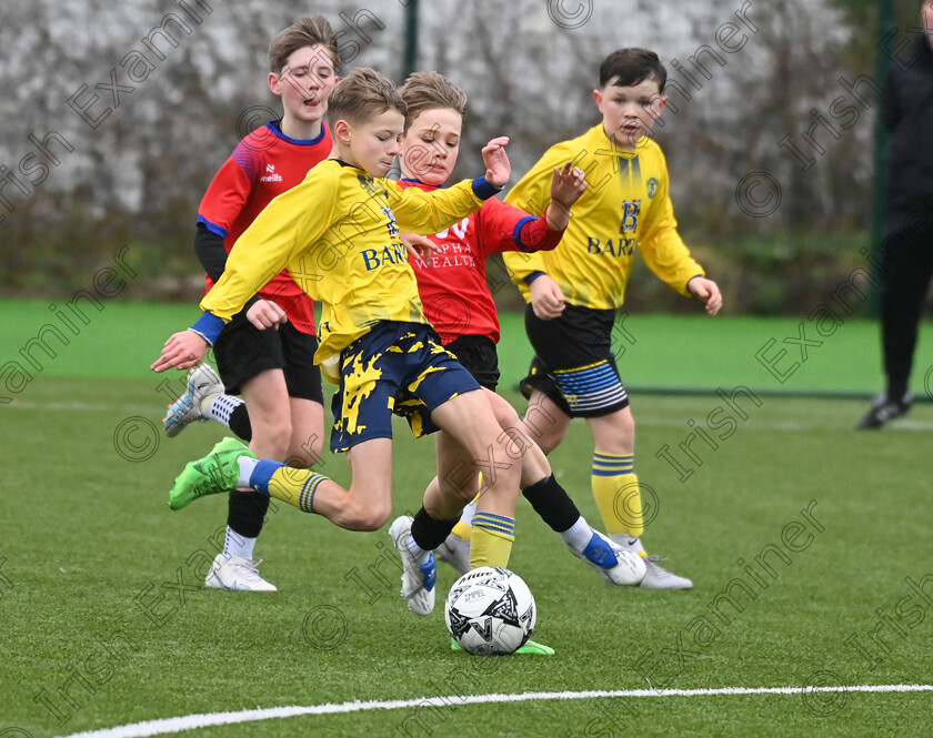 Johnny-Lehane 
 1st February 2025; Douglas Hall's Johnny Lehane shoots past Leeside United's OJ Burke during the Roy Keane under 13 premier league at Leeside park. Picture: Eddie O'Hare