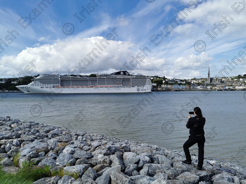IMG 20230509 155917 
 Photographer on the rocks. A cruiser pulls into Cobh bringing over 4000 passengers.