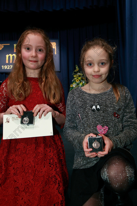 Feis07022018Wed12 
 12
Silver Medallist Georgina Ellen Hynes McLaughlin and Bronze Medallist Caoimhe Owen.
 Instrumental Music Class: 167: Piano Solo8 Years and Under Feis Maitiú 92nd Festival held in Fr. Mathew Hall. EEjob 05/02/2018 Picture: Gerard Bonus.