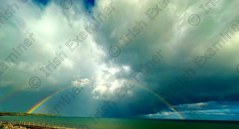 Rianbow. 
 Rainbow over garryvoe beach just after a heavy shower early spring