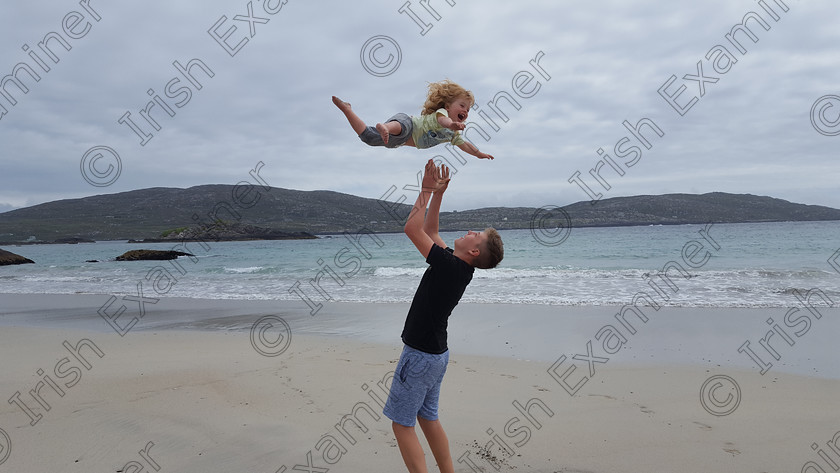 20160813 022351 
 piture of Big brother Marcus Corcoran having great fun throwing little brother Robert up into the air at Derrynane beach kerry taken by there mom Susan