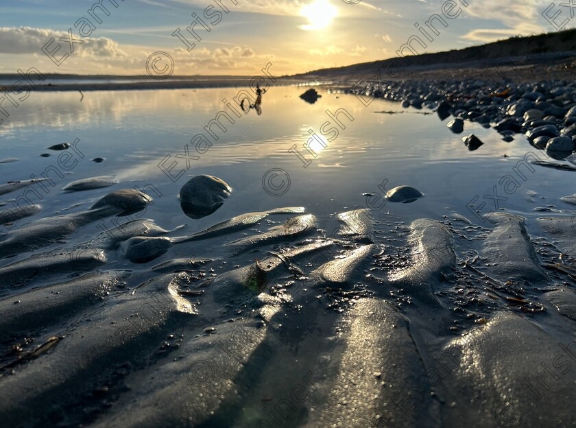 IMG 1209 
 Caption : Garryvoe Rock-pool Reflection. 
 Location : Ballinwilling Beach, east of Garryvoe, Co. Cork.
Subject: Rock pool reflection, after the tide had turned.
 Situation as follows.
Heading home having been on the beach for a few hours. Afternoon Tide was incoming on a lovely late summer day at Ballinwilling Beach, east of Garryvoe, Co. Cork. Late afternoon sun, walking west towards Garryvoe Beach with Ballycotton on my left side, into the soon to be setting sun.
As I stepped over, It literally begged me to take the photo, so I took a step back, crouched as low as possible and captured it. 
I had an I-phone 4 !! Not my usual Nikon Camera but I couldnâ€™t pass a capture like this, so I turned the phone on to landscape profile, and took the shot.ðŸ˜€
Photo credit: Paul Power, Mogeely Road, Castlemartyr, Co. Cork. P25DH21