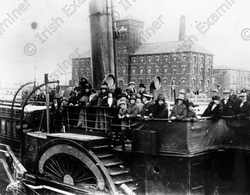 -1310458344 
 TENDER VESSEL "IRELAND" AT CORK QUAYS. SOUTH JETHIES VICTORIA QUAY AS PEOPLE TRIED TO SEE THE TITANIC. FURLONGS MILLS CAN BE SEEN IN THE BACKGROUND.
PICTURE CREDIT: THE EXAMINER TITANIC ARCHIVE