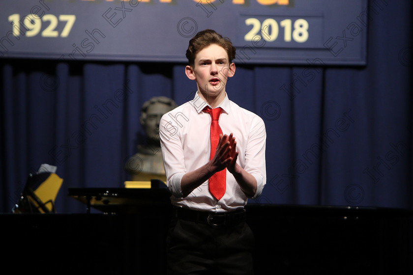 Feis27022018Tue18 
 17~18
 Peter Long from Ballyvolane performing “Luck be a lady tonight” from Guys and Dolls with Accompanist Deirdre Collins