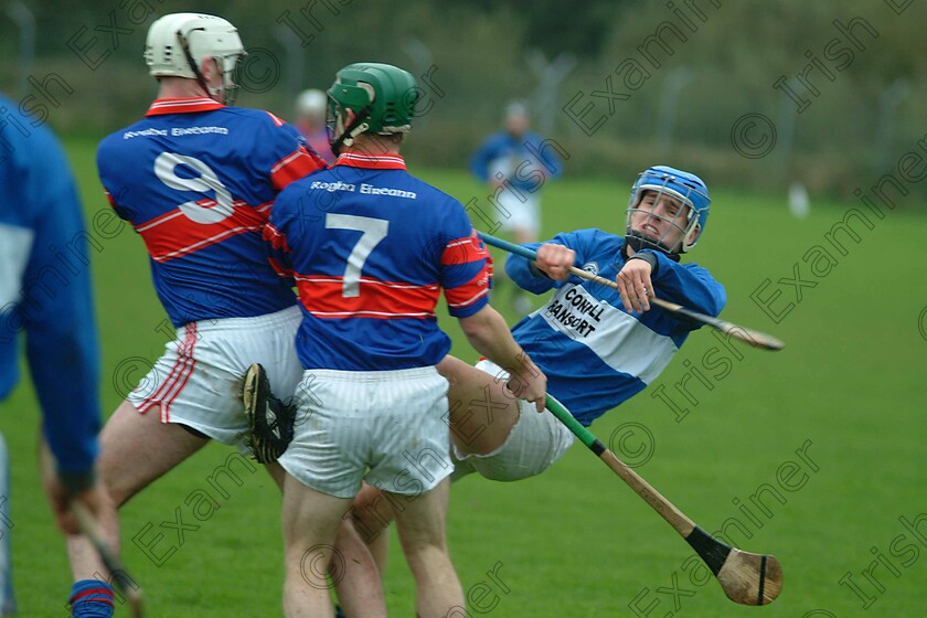 530824 
 Paul Goggin, Sarsfield is knocked off the ball by Alan Lane, Erins Own during a physically contested East Cork U21 AHC Final at Rostellan on Saturday October 23rd 2004.
Pic: Larry Cummins
Echo marking