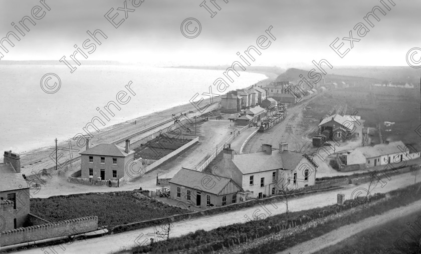 821922 
 For 'READY FOR TARK'
Youghal railway station in the early part of the 20th. century old black and white trains seaside railroad