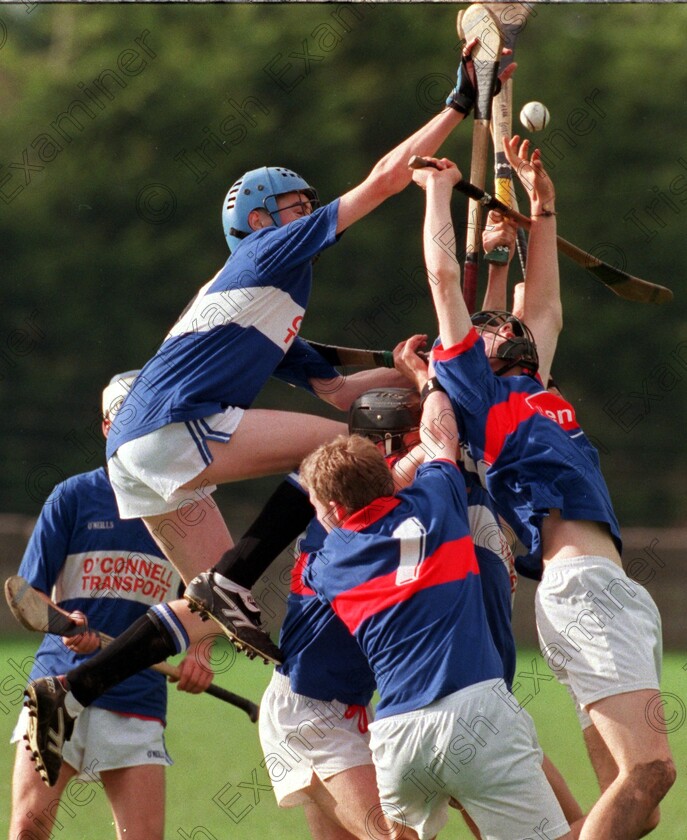 119395 -1272357442 
 Sarsfields David Kenneally leaps in to try and win the ball against Erins Own during the Premier minor hurling championship final at Carrigtwohill. Picture; Eddie O'Hare CORK MINOR HURLING 99 
 Keywords: PUBDATE_??_??_3_1999_10_04