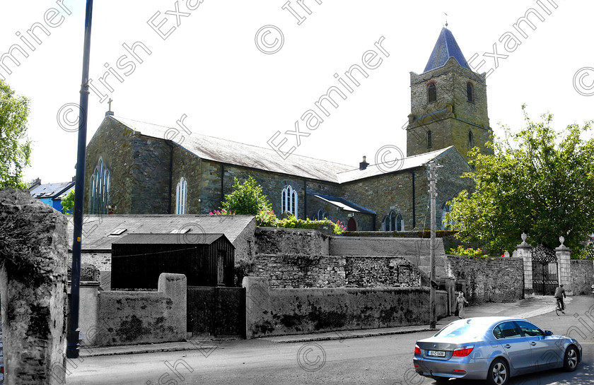 LC-kinsale-series-11-mix-hires 
 Kinsale Now and Then photo spread. Pic; Larry Cummins Thursday 15th June 2017.
View from Church Square of Saint Multose Church, Kinsale, Co. Cork.
Cars parked, and pedestrians on footpath give good comparison to old photo which includes a man on a bike and no cars.