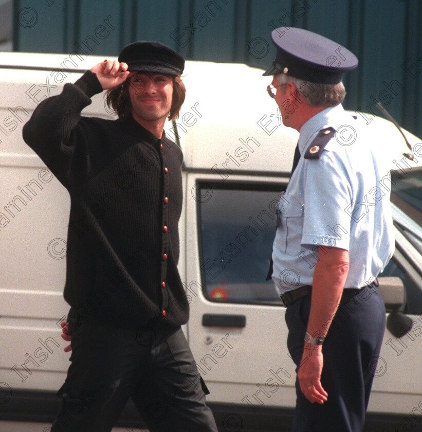 22660 
 LIAM GALLAGHER OF OASIS SALUTES TO THE CROWD ON HIS ARRIVAL AT CORK AIRPORT YESTERDAY.PICTURE DAN LINEHAN