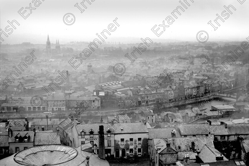 805348 805348 
 For 'READY FOR TARK'
Lavitt's Quay and North Gate Bridge as seen from Shandon in 1932. Ref. 820A Old black and white city views quays smog