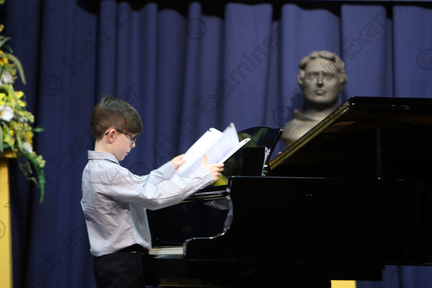 Feis02022018Fri06 
 6
Kyle O’Regan fixing his Music.
 Instrumental Music Class: 187: Piano Solo 9 Years and Under –Confined Feis Maitiú 92nd Festival held in Fr. Matthew Hall. EEjob 02/02/2018 Picture: Gerard Bonus.