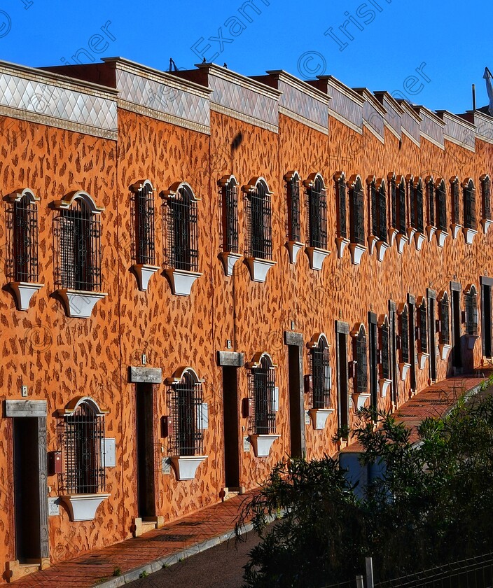 James Grandfield Terreros 
 Some terraced houses in the scenic Spanish town of San Juan de los Terreros