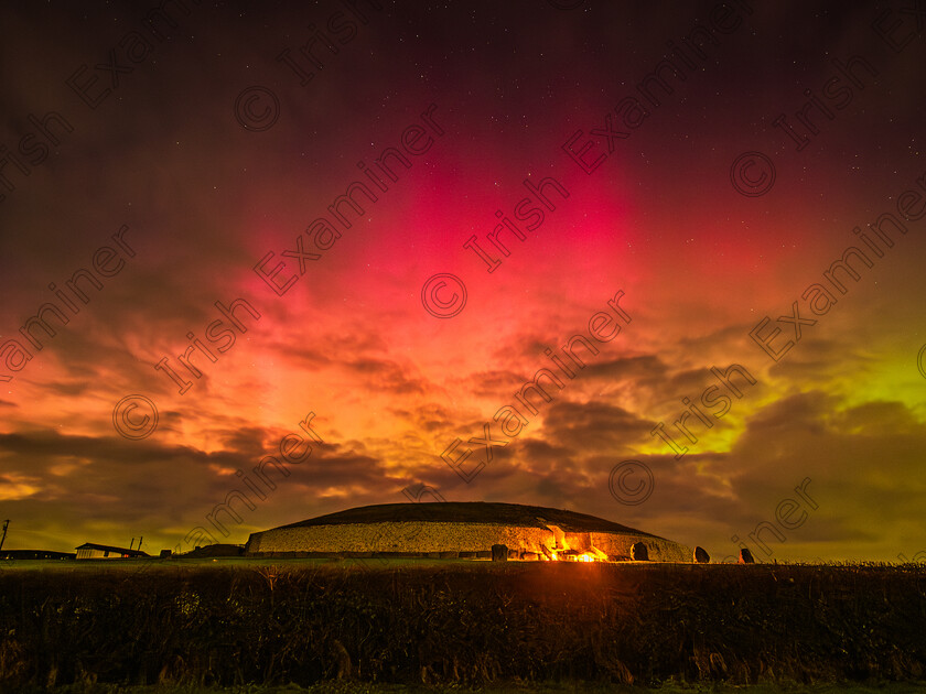 Newgrange Aurora Borealis 1 January 2025 
 The New Year's Day 2025 aurora borealis visible through the clouds over Newgrange, Co. Meath. Picture: Sryan Bruen