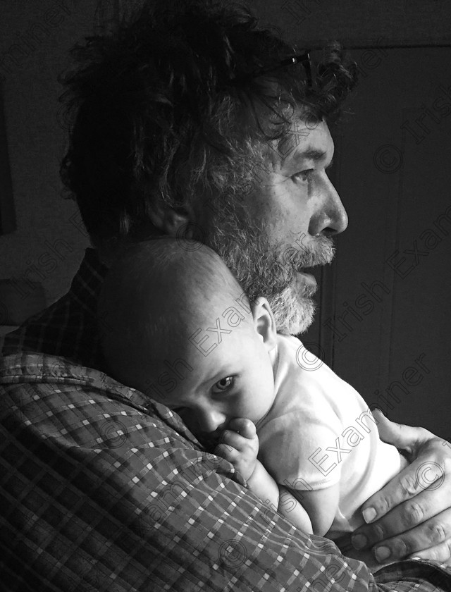 Alex and Baby 
 Baby Olive Rose in Granddad Alex's arms, pictured in Concord, New Hampshire, USA. "Present And Future". Picture: Martina McNicholas
