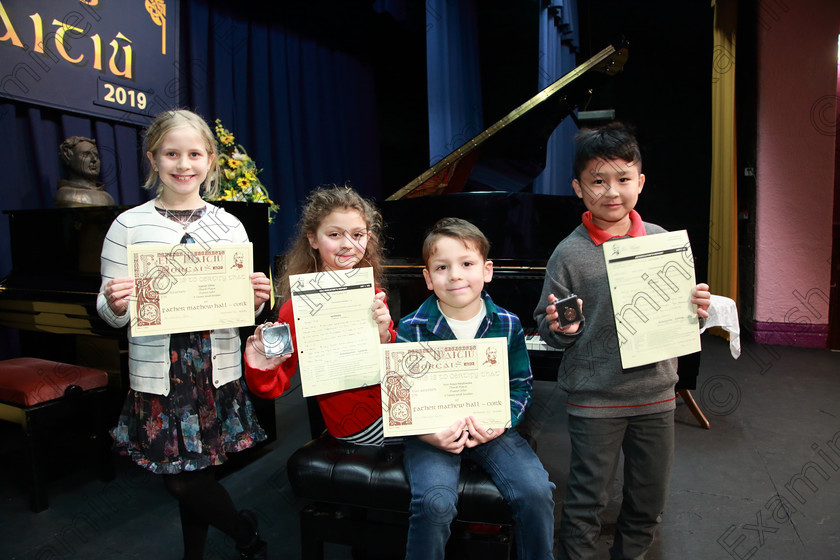 Feis05022019Tue10 
 10
3rd place Sadhbh White from Waterfall; Silver Medallist Isabelle Plaice from Farnanes; 3rd place Aron Araya Naratowska from Douglas and Bronze Medallist Ryan Li from Douglas.

Class: 187: Piano Solo 9 Years and Under –Confined Two contrasting pieces not exceeding 2 minutes.

Feis Maitiú 93rd Festival held in Fr. Matthew Hall. EEjob 05/02/2019. Picture: Gerard Bonus