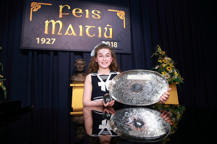 Feis07032018Wed17 
 17~18
Overall Winner with 88 marks, Silver Medallist section 3, Mia Jones from Douglas for her performance of “Let Me Entertain You” from Gypsy beating out over 60 performers.
 Singing and School Choirs Class: 113: “The Edna McBirney Memorial Perpetual Award” Solo Action Song 12 Years and Under Section 3 Feis Maitiú 92nd Festival held in Fr. Mathew Hall. EEjob 06/03/2018 Picture: Gerard Bonus.