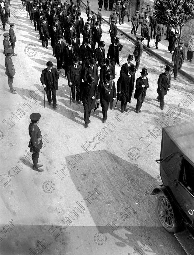 425862 
 The Cunard liner Lusitania, carrying 1,918 passangers and crew, was hit by a torpedo fired from a German U-boat at 2.00 p.m. on the afternoon of May, 7th., 1915. 764 people survived the sinking which took place10 miles off the Old Head of Kinsale. A total of 169 of the 289 bodies recovered from the Lusitania were buried at the Old Church (Clonmel) Cemetery in Cobh (Queenstown). Picture shows part of the funeral cortege to the cemetery on Monday, May 10th., 1915. Ref. 44
Old black and white war ships boats tragedies funerals burials