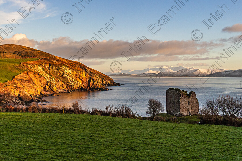 Minard Castle and Magillicuddy Reeks-1347 
 Minard Castle Lispole Co Kerry looking across at a snowcapped Magillicuddy Reeks mountain range with Carrauntoohil in the centre.Photo taken Jan 7th 2025 by: Noel O Neill 
 Keywords: Lispole, Minard, Reeks, snow