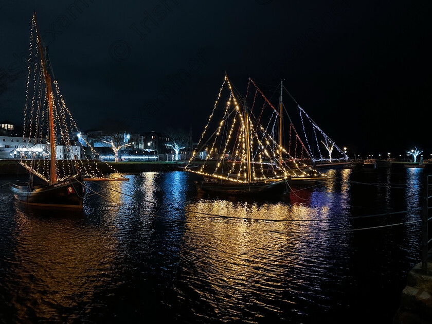 IMG 0470 
 Galway hooker boats lit up for the festive season
Claddagh, Galway, Ireland