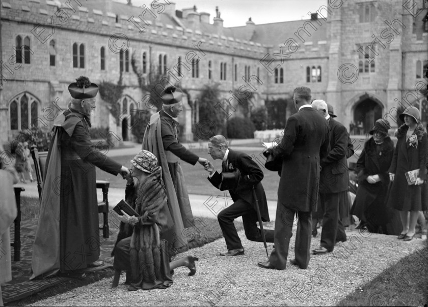 1230546 
 Queueing up to kiss the rings of bishops (including Daniel Cohalan of Cork on left) attending Catholic Emancipation celebrations at University College Cork 6/7/1929 Ref. 374A old black and white religion UCC