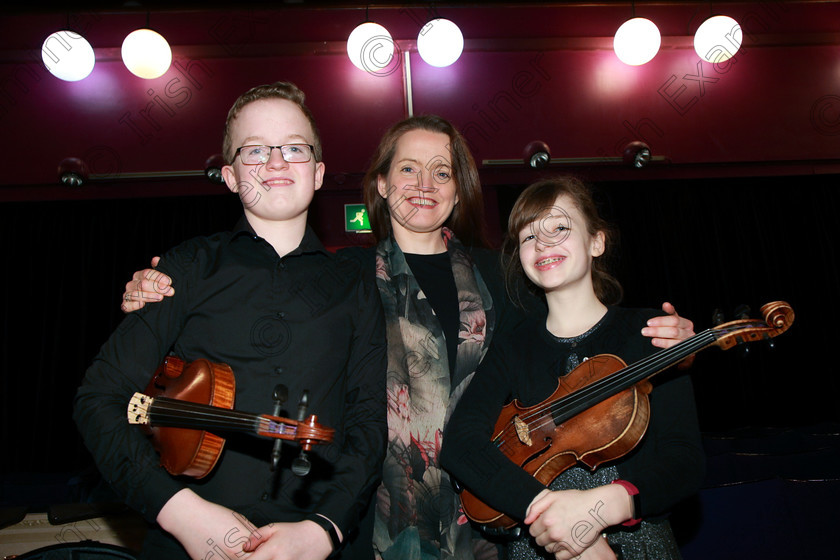 Feis01022018Thu07 
 7
Brother and Sister Duo Cillian Ó Cathasaigh and Niamh Ní Cathasaigh from Farran with their mother and accompanists Caroline Uí Cathasaigh.
 Instrumental Music Class: 267: Duo Classes and Chamber Music Junior Feis Maitiú 92nd Festival held in Fr. Matthew Hall. EEjob 01/02/2018 Picture: Gerard Bonus.