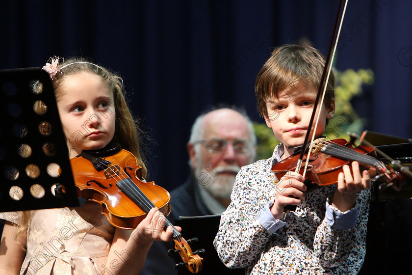 Feis29012018Mon42 
 42
Ruby Mae Sheehan Maguire and Ultan McCarthy are part of an Orchestra that Adjudicator Richard Deering set up for the performers.
 EEjob 29/01/2018 
Feis Maitiú 92nd Festival held in Fr. Matthew Hall 
Picture: Gerard Bonus

Instrumental Music 
Class: 242: Violin Solo 8 years and under.