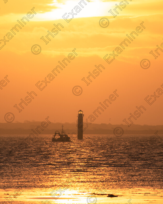 South Park (5 of 8) 
 A boat makes it's way out on the Galway bay at sunrise. Co. Galway. Picture: Brendan O'Brien