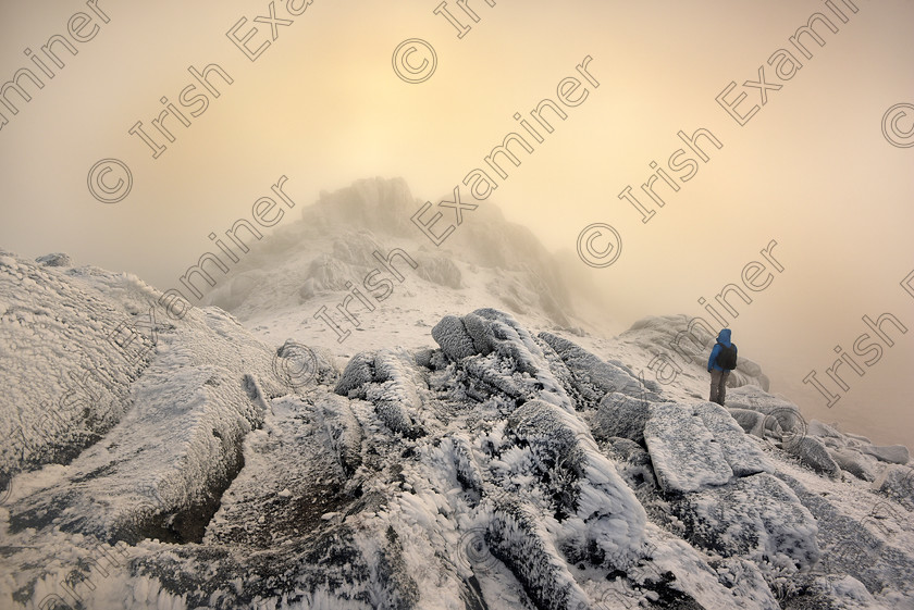 The Appearing 
 Approaching the frozen summit of Slieve Bearnagh in the Mourne Mountains just after sunrise.