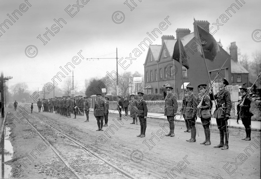 8291811 
 Members of the Cork Corps of the National Volunteers preparing to march in the St Patrick's Day Parade in Cork. March 17, 1916.