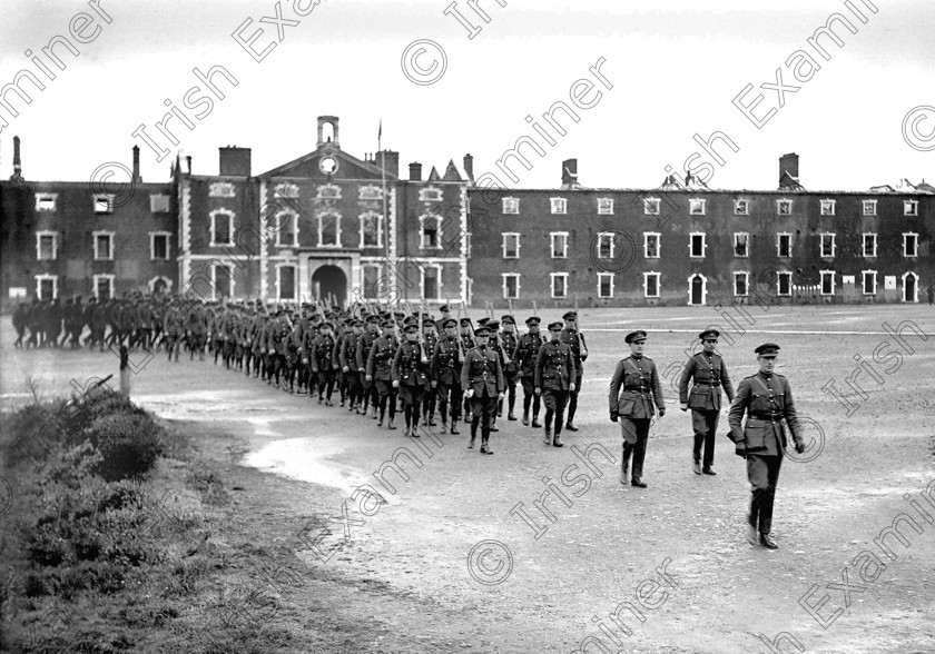 1335296 
 For 'READY FOR TARK'
Members of the Irish Free State Army take over a ruined Michael (Collins) Barracks, Old Youghal Road, Cork at the end of the Civil War in 1923 Ref. 1549 old black and white soldiers troops 
enhanced version 
 Keywords: Collins Barracks 1923