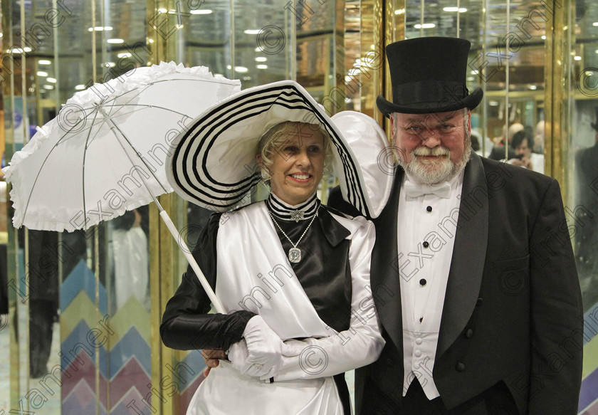 BRITAIN Titanic 30 
 Americans Mike and Sherri Adgie from Atlanta, passengers of the MS Balmoral Titanic memorial cruise ship pose for pictures following a reception in the Atlantic Ocean, Friday, April 13, 2012. Nearly 100 years after the Titanic went down, the cruise with the same number of passengers aboard is setting sail to retrace the ship's voyage, including a visit to the location where it sank. The Titanic Memorial Cruise departed Sunday, April 8, from Southampton, England, where the Titanic left on its maiden voyage and the 12-night cruise will commemorate the 100th anniversary of the sinking of the White Star liner early Sunday, April 15, 2012. (AP Photo/Lefteris Pitarakis)