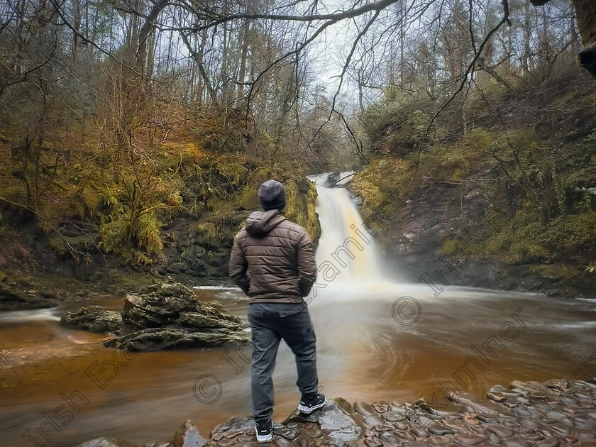 IMG 0817 
 Admiring the stunning Tourmakeady Waterfall
Location: Tourmakeady, Co. Mayo