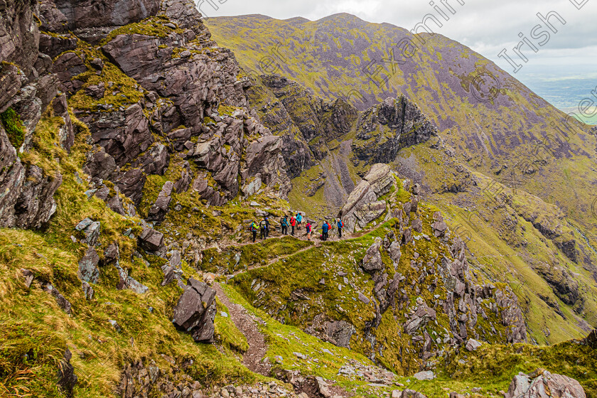 Heavenly Gates-Carrauntoohil-2016 
 Dingle Hillwalking Club members planning their descent strategy at the "Heavenly Gates" on the slopes of Carrauntoohil last Sunday May 22nd 2022.Photo by: Noel O Neill 
 Keywords: Carrauntoohil, DHC, Heavenly Gates