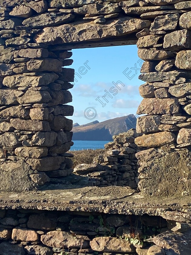 IMG 3739 
 â€œThe three sisters â€œ taken through the window of an old stone building at Ballydavid, Co Kerry. Just went to inspect the stonework on the building when I caught the view through the window opening.