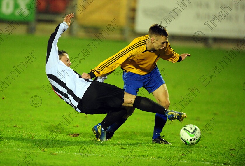 1574590 
 College Corinthians Evan Browne is tackled by Midleton's Ian Stack during the Keane cup final against Midleton FC at Turners Cross
Picture: Eddie O'Hare